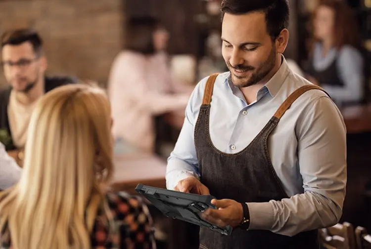 Mobile POS ordering in a restaurant.